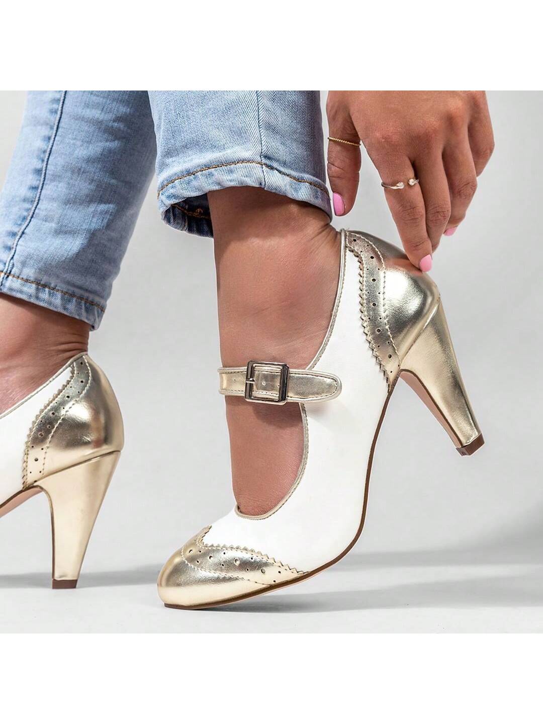 kym-gold-and-white